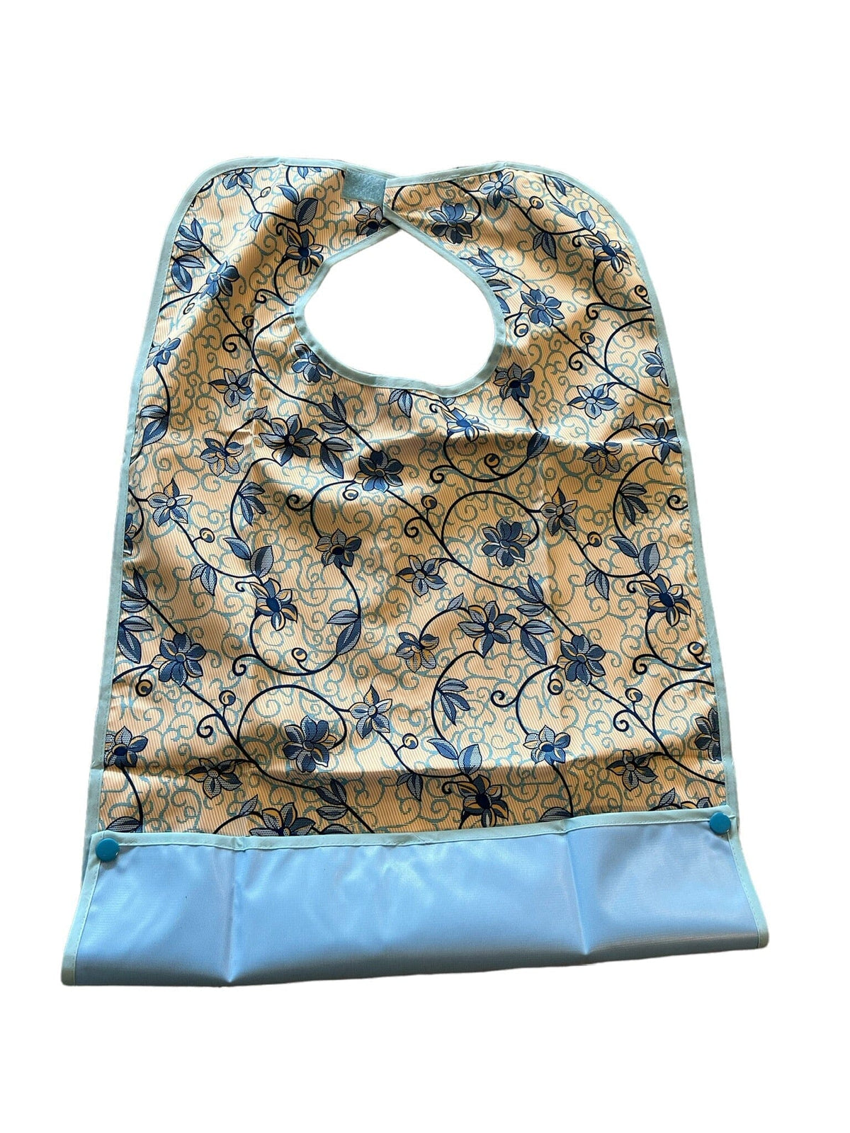 Spisestykke med velkro lukning - let at rengøre (65x45). 4 forskellige farver - Seniorpleje - Diverse køkkenhjælpemidler - Seniorpleje - AMZ-ROSE 06 - Beige med blå blomst - -